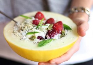 A healthy snack made with berries, yogurt, and chia seeds.